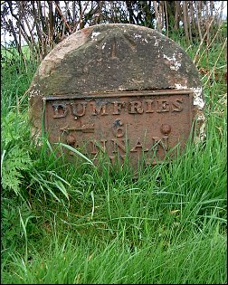 detail of Dumfries 6 Annan 11 milestone at NY057731