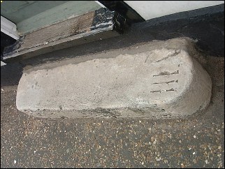 detail of Wymondham doorstep milestone at TG110015