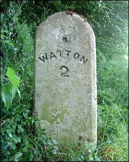 detail of Summer Lane Watton milestone at TF947009