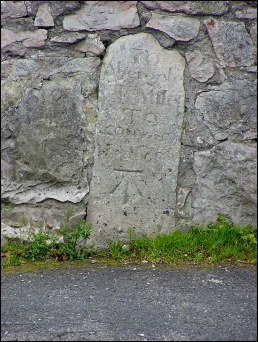 detail of Highland Rd milestone at SH883785