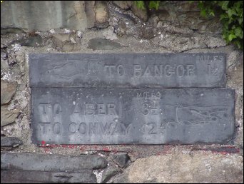detail of Llandygli milestone at SH598709