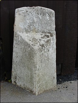 detail of Castle Hedingham milestone at TL786355